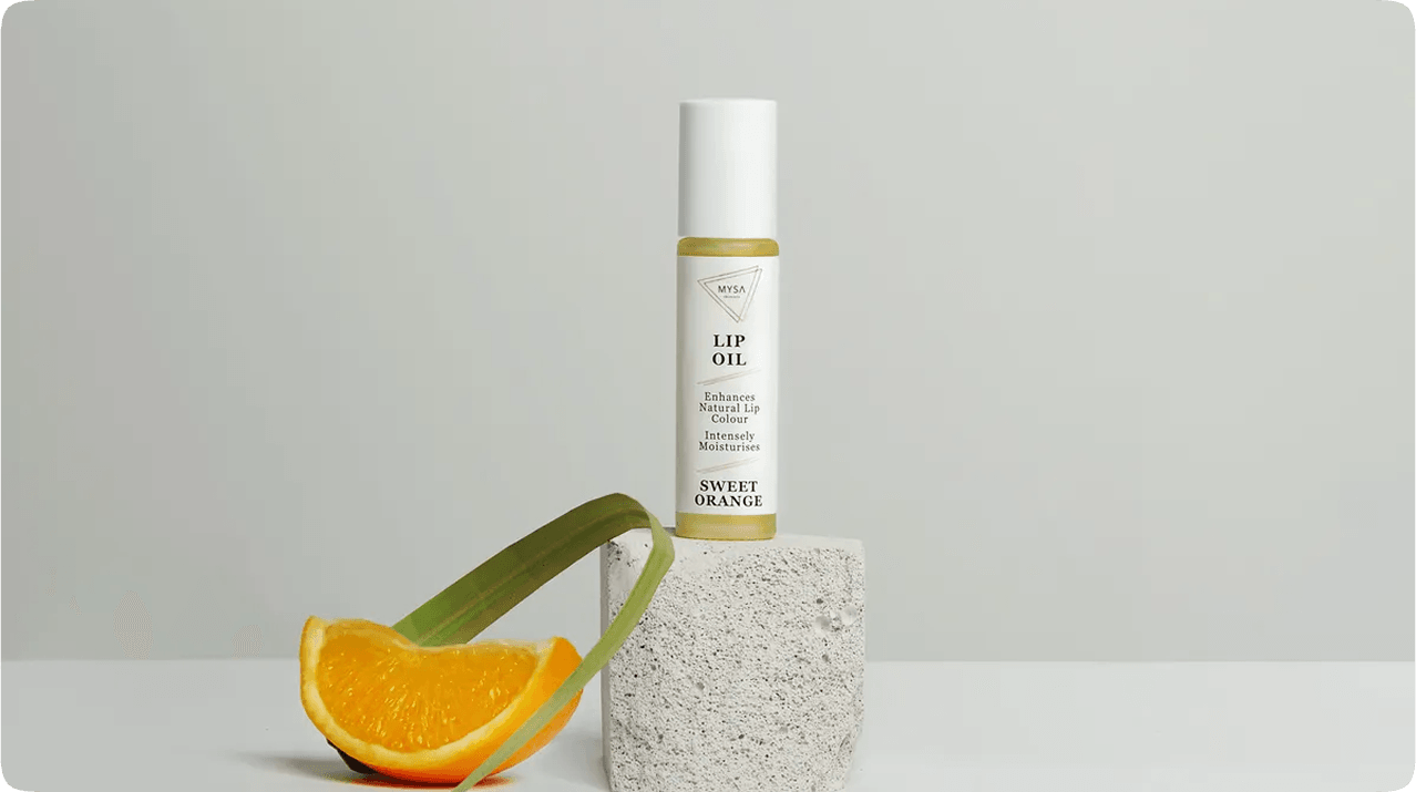 Lip oil with orange slice